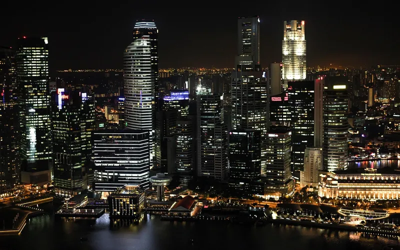 Singapore buildings skyline city lights night sky